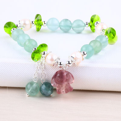 8MM Halbpreisgestein Fluorit mit lila Melodie Schnitzerei Stretch Armband zum Geschenk