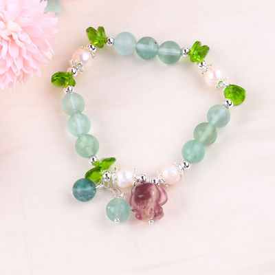 8MM Halbpreisgestein Fluorit mit lila Melodie Schnitzerei Stretch Armband zum Geschenk