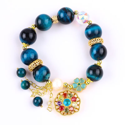 14MM Energieheilung Kristall Blau Tiger Auge Blume Spinner Charm Perlen Armband für tägliche Tragen