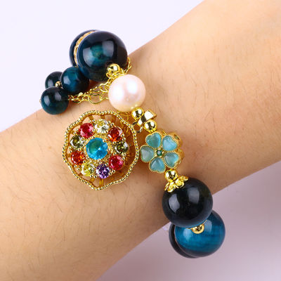 14MM Energieheilung Kristall Blau Tiger Auge Blume Spinner Charm Perlen Armband für tägliche Tragen